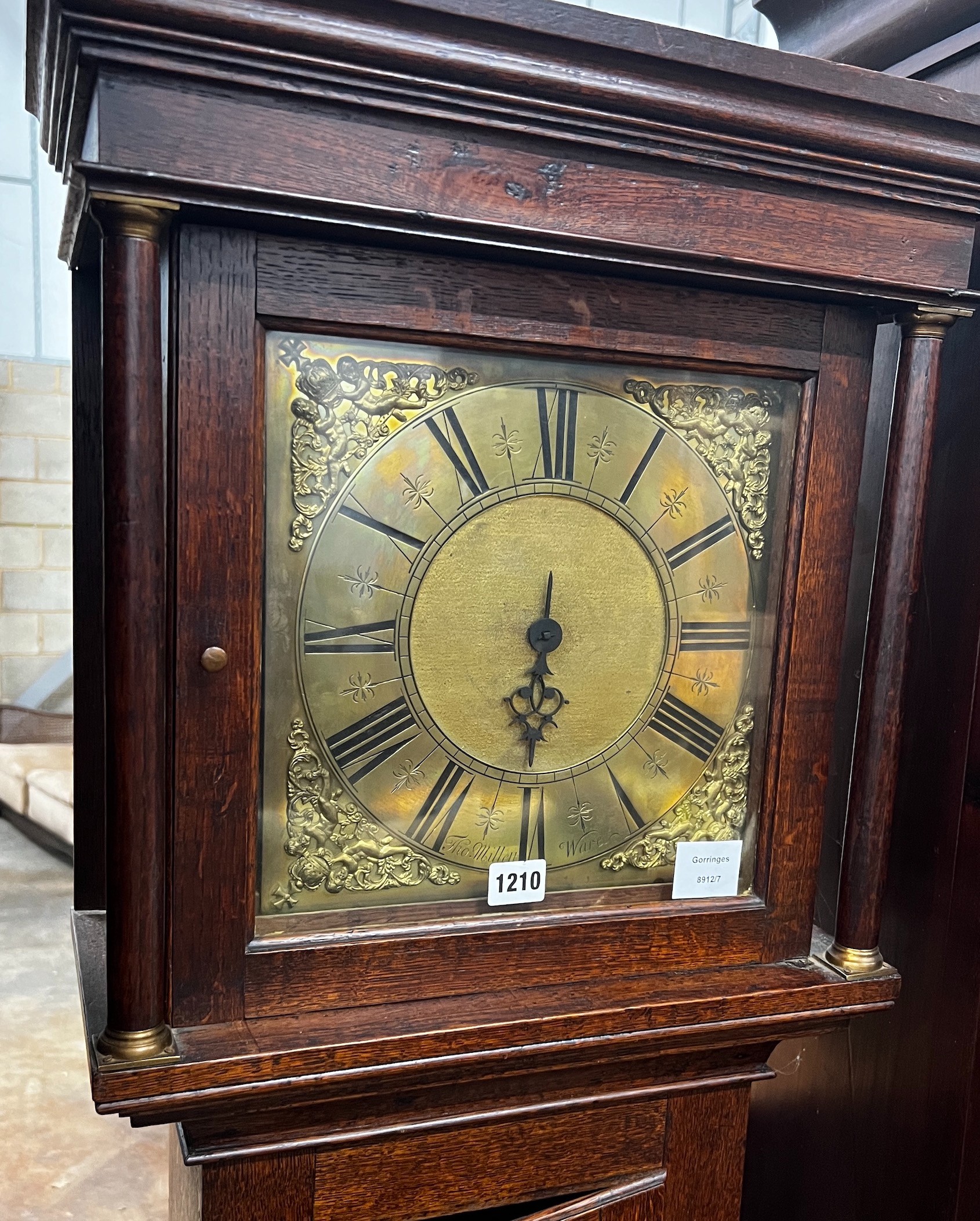 An 18th century oak 30 hour longcase clock, the engraved brass dial signed Thomas Millett 'Ware', height 195cm